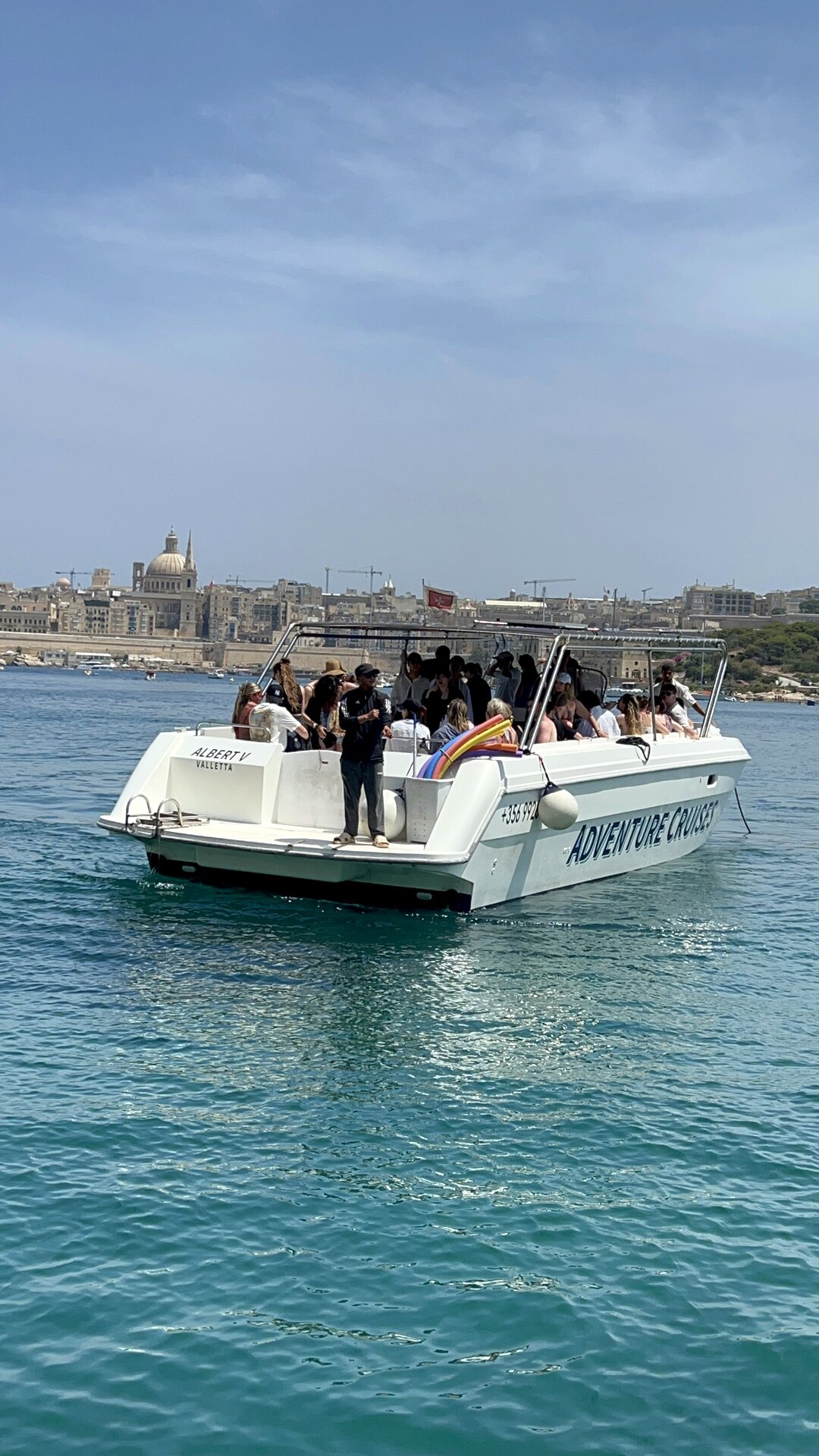 Albert V — Adventure Cruises Malta powerboat, stern view returning to Sliema.